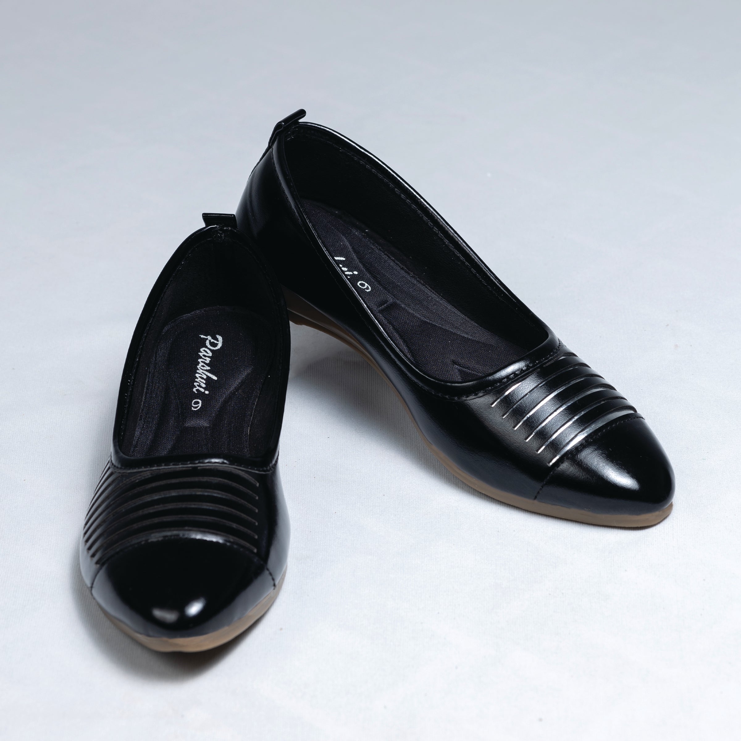 Parshni Women Black Leaser with Silver Display Pointed Toe Ballerians for Party Use